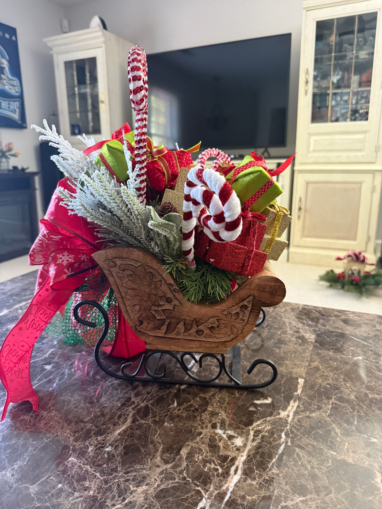 Candy Cane Sleigh Arrangement – Red & Gold Christmas Centerpiece with Gifts and Greens | Madison on Main | One of a Kind