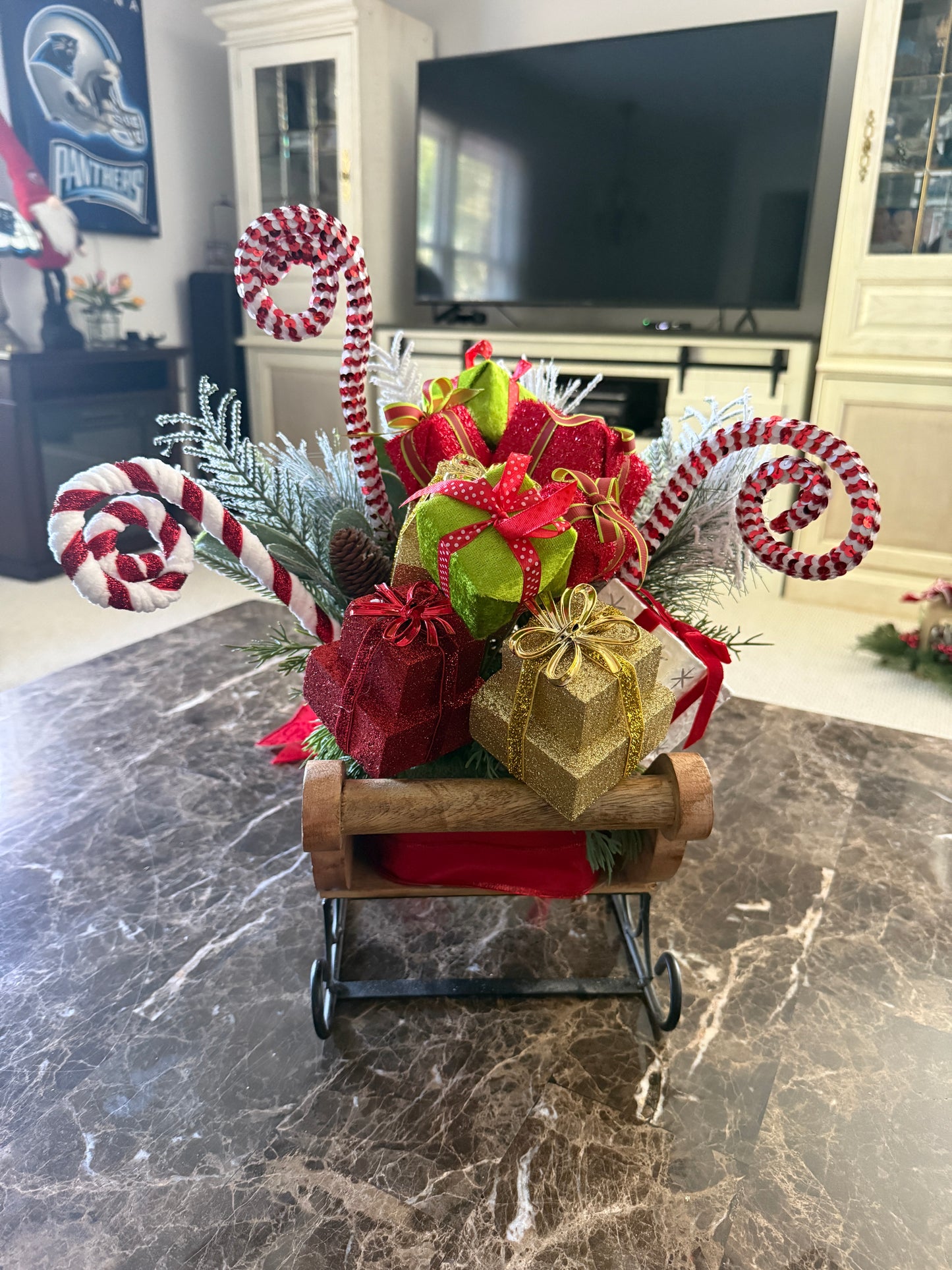 Candy Cane Sleigh Arrangement – Red & Gold Christmas Centerpiece with Gifts and Greens | Madison on Main | One of a Kind