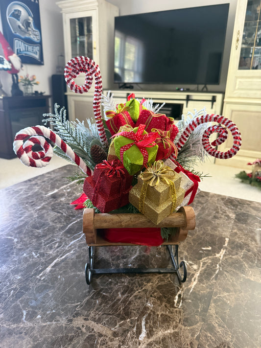 Candy Cane Sleigh Arrangement – Red & Gold Christmas Centerpiece with Gifts and Greens | Madison on Main | One of a Kind