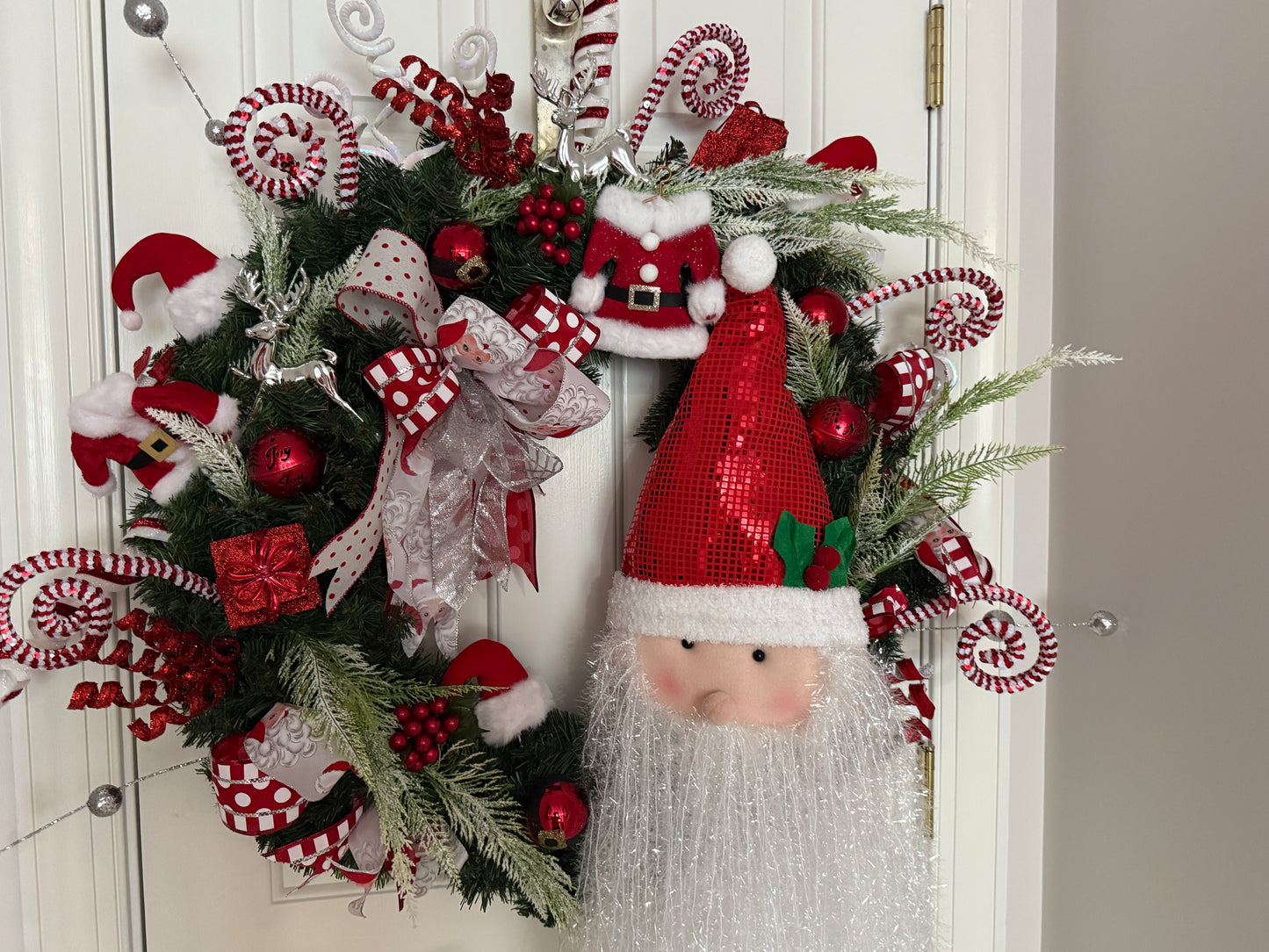 Santa’s Workshop Wreath – Whimsical Red & White Christmas Wreath with Santa and Candy Cane Accents | Madison on Main | One of a Kind